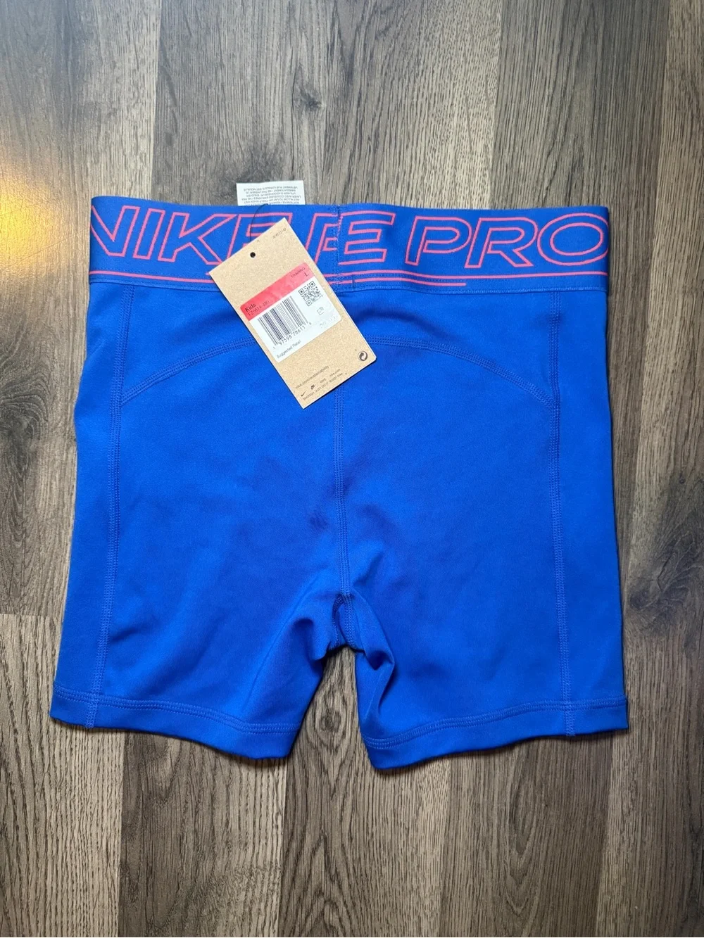 Nike Blue Compression Shorts with Pink Accents